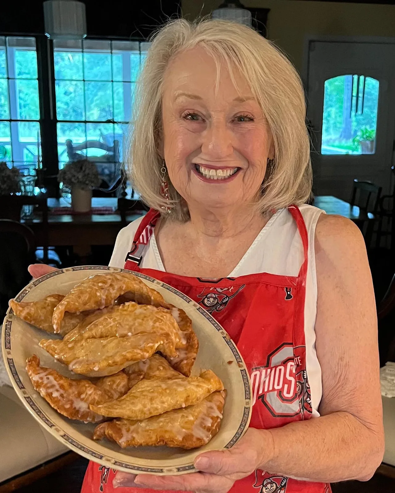 Brenda Gantt presenting a platter of fried pies